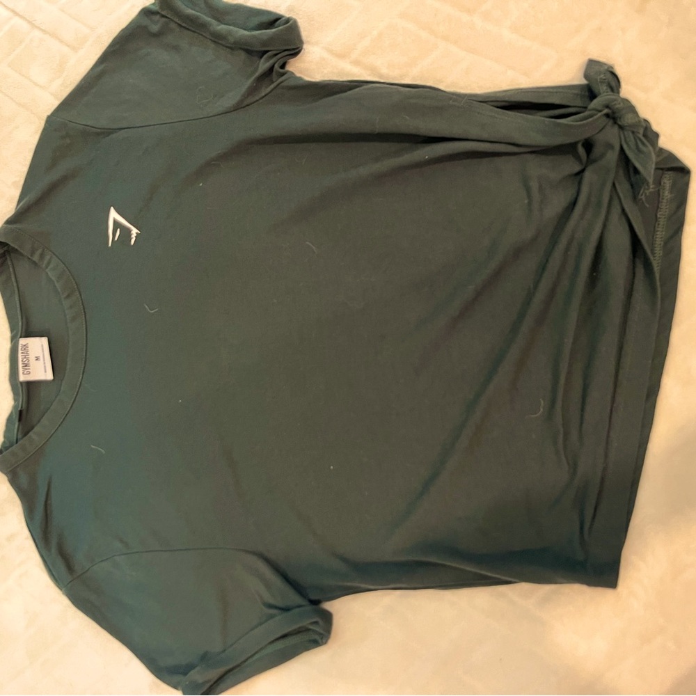 Dark green gymshark shirt